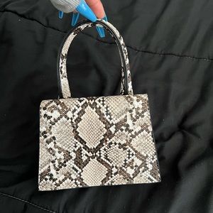 Tiny snake skin bag
